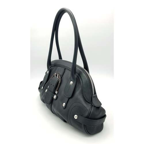 331 - A Salvatore Ferragamo Black Leather Handbag. Crafted in structured black leather with silver-tone ha... 