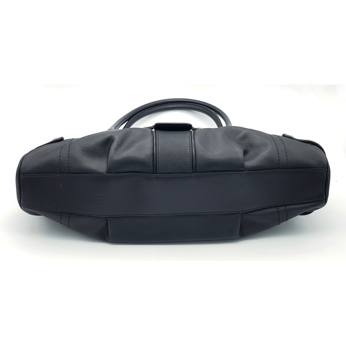 331 - A Salvatore Ferragamo Black Leather Handbag. Crafted in structured black leather with silver-tone ha... 