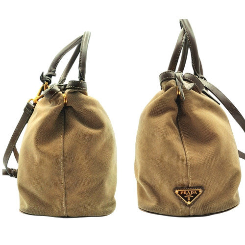 351 - A Prada Beige Canvas and Brown Leather Tote Bag. Crafted in beige canvas with an embroidered “PRADA ... 