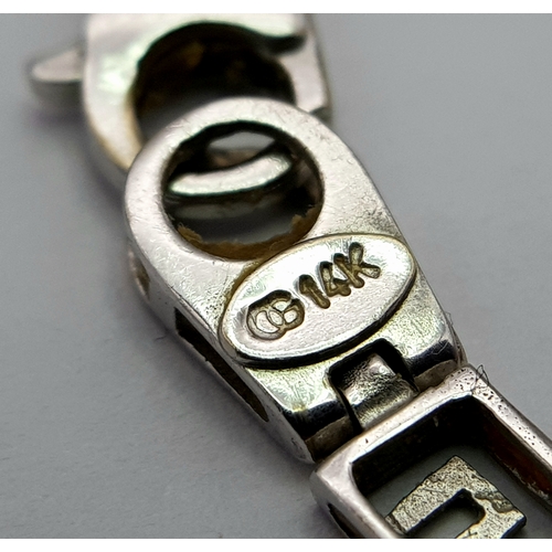 31 - A 14K White Gold Articulated Choker Necklace. Geometric pattern openwork design. 42cm. 14.65g.