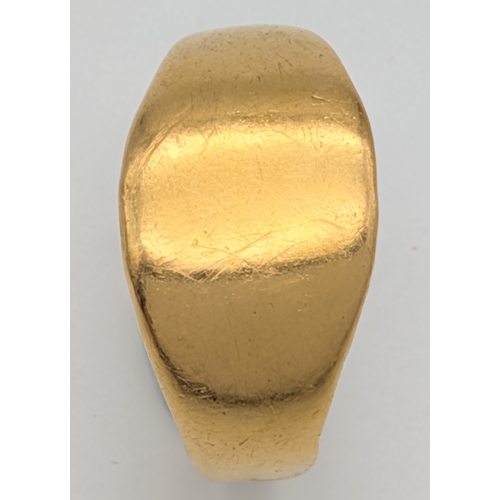 53 - An 18K Yellow Gold (tests as) Signet Ring. Band is slightly misshapen so as found. Size T. 5.4g