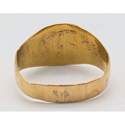 53 - An 18K Yellow Gold (tests as) Signet Ring. Band is slightly misshapen so as found. Size T. 5.4g
