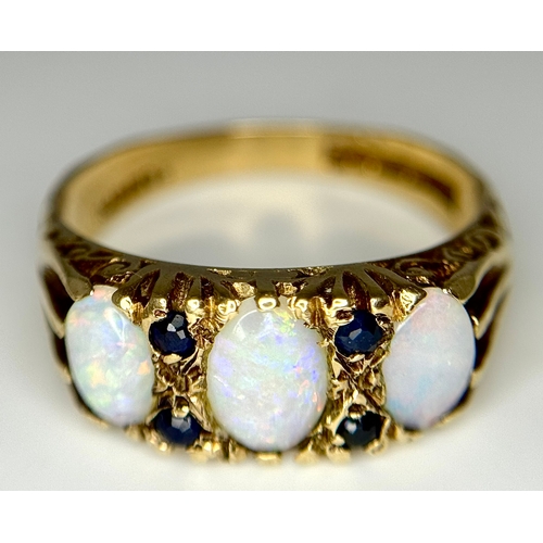 708 - A 9K Yellow Gold Opal and Blue Stone Ring. Size O 1/2 - P. 3.1g total weight. Ref: 1/41156