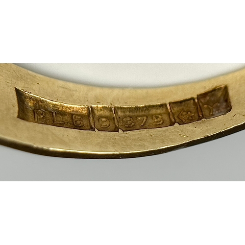 708 - A 9K Yellow Gold Opal and Blue Stone Ring. Size O 1/2 - P. 3.1g total weight. Ref: 1/41156