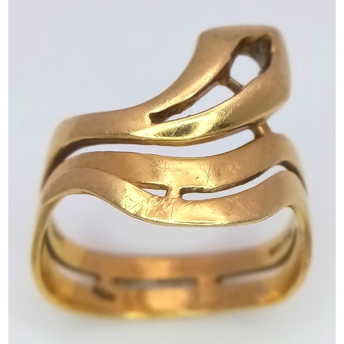 81 - An 18K Gold Openwork Abstract Swirl Ring. Size K 1/2. 4.75g.