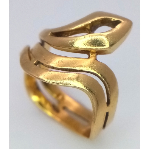 81 - An 18K Gold Openwork Abstract Swirl Ring. Size K 1/2. 4.75g.