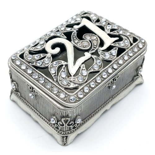 337 - A Small Decorative Trinket Box with Removable Lid. Features rectangular form with ornate detailing, ... 
