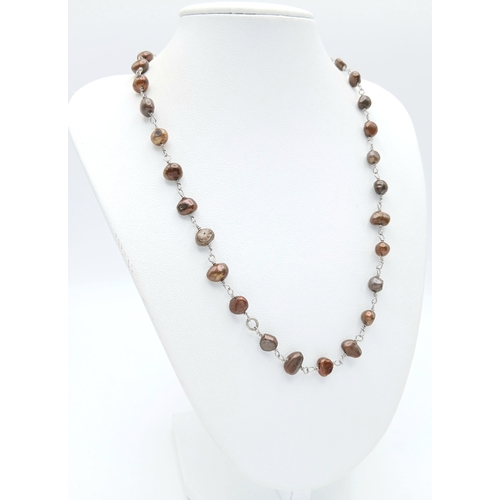 339 - A Lovely Brown Freshwater Pearl Necklace. Approx 40cm in length. Please see photos for details.