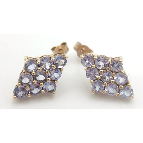 1259 - A Pretty Pair of 9K Gold Tanzanite Set Stud Earrings. 13mm Length. 9mm Width. Combined Gross Weight ... 