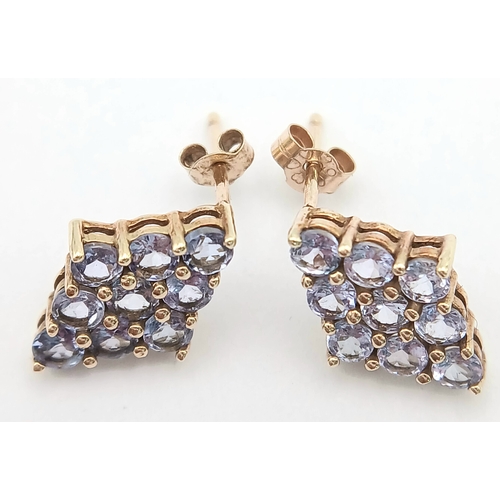 1259 - A Pretty Pair of 9K Gold Tanzanite Set Stud Earrings. 13mm Length. 9mm Width. Combined Gross Weight ... 