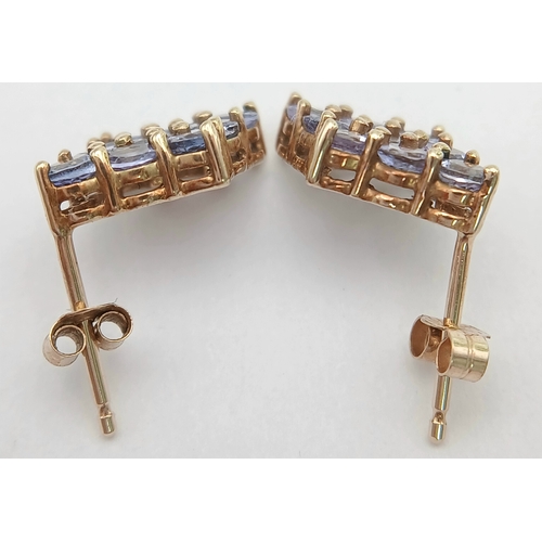 1259 - A Pretty Pair of 9K Gold Tanzanite Set Stud Earrings. 13mm Length. 9mm Width. Combined Gross Weight ... 