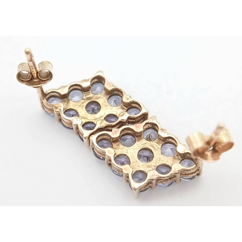 1259 - A Pretty Pair of 9K Gold Tanzanite Set Stud Earrings. 13mm Length. 9mm Width. Combined Gross Weight ... 