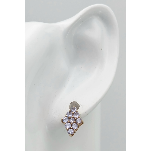 1259 - A Pretty Pair of 9K Gold Tanzanite Set Stud Earrings. 13mm Length. 9mm Width. Combined Gross Weight ... 
