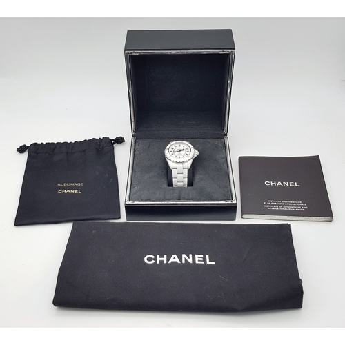 107 - A Chanel J12 Automatic Ceramic Ladies Watch. White ceramic bracelet and case - 38mm. Opaque white di... 