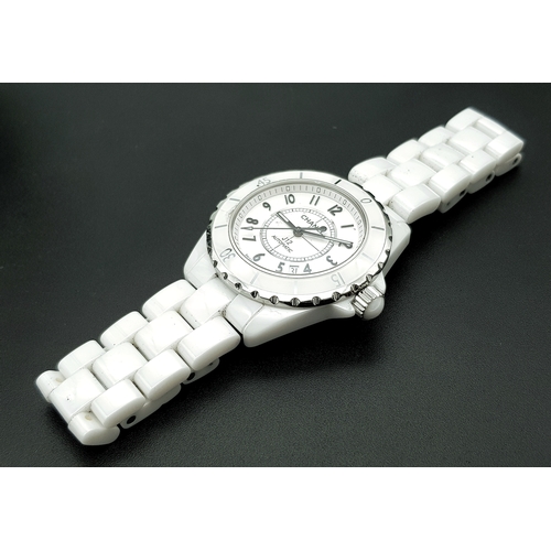 107 - A Chanel J12 Automatic Ceramic Ladies Watch. White ceramic bracelet and case - 38mm. Opaque white di... 