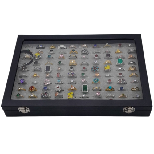 1212 - A Jewellery Display Case with 100 Rings! An absolutely fabulous lot with different colored stones to... 