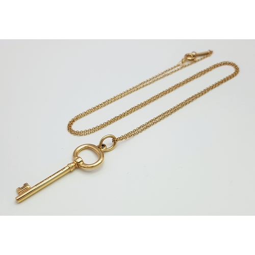 15 - A TIFFANY AND CO, 18K ROSE GOLD, KEY DESIGN PENDANT ON CHAIN NECKLACE. 4.4G. SC 8042
