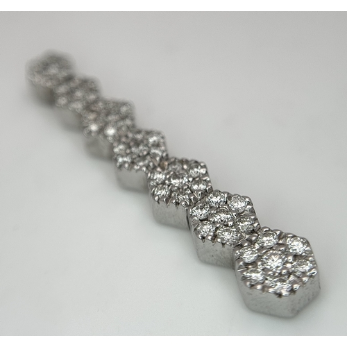 36 - AN 18K WHITE GOLD, DIAMOND SET, DROP PENDANT. 0.40 CTW. 4.8G. SC 8055