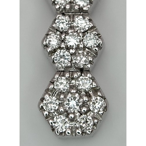 36 - AN 18K WHITE GOLD, DIAMOND SET, DROP PENDANT. 0.40 CTW. 4.8G. SC 8055