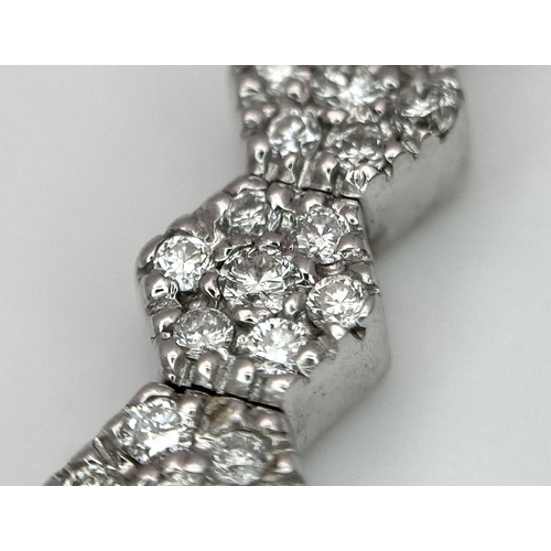 36 - AN 18K WHITE GOLD, DIAMOND SET, DROP PENDANT. 0.40 CTW. 4.8G. SC 8055