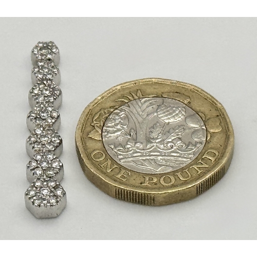 36 - AN 18K WHITE GOLD, DIAMOND SET, DROP PENDANT. 0.40 CTW. 4.8G. SC 8055