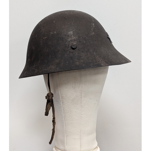 41 - 1932 Model Japanese Helmet with liner.