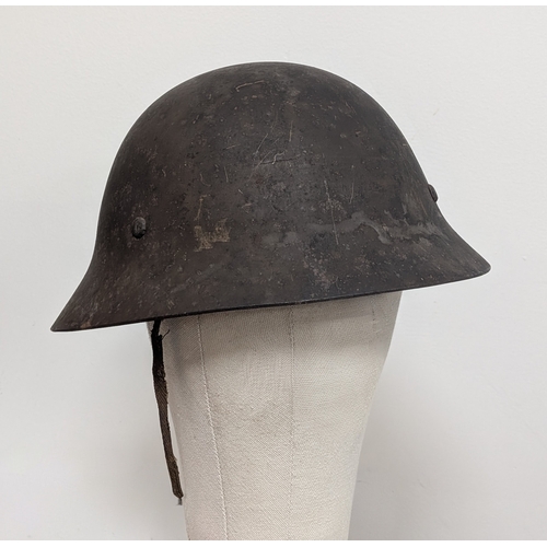 41 - 1932 Model Japanese Helmet with liner.