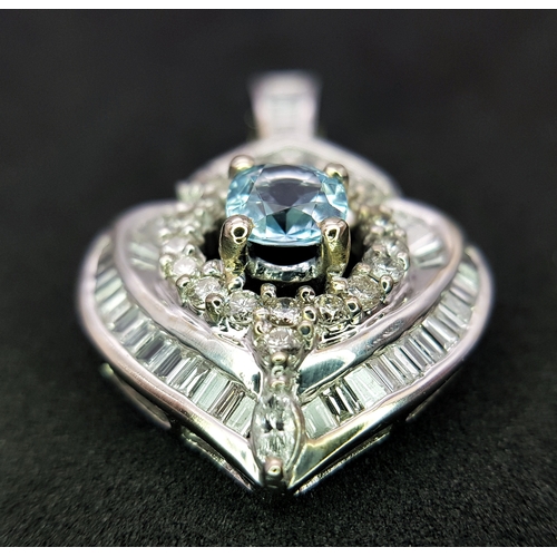 43 - AN 18K WHITE GOLD, DIAMOND AND AQUAMARINE SET, FANCY PENDANT. 0.90CTW. 9.6G. 6429