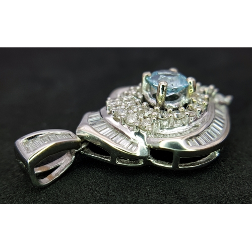 43 - AN 18K WHITE GOLD, DIAMOND AND AQUAMARINE SET, FANCY PENDANT. 0.90CTW. 9.6G. 6429
