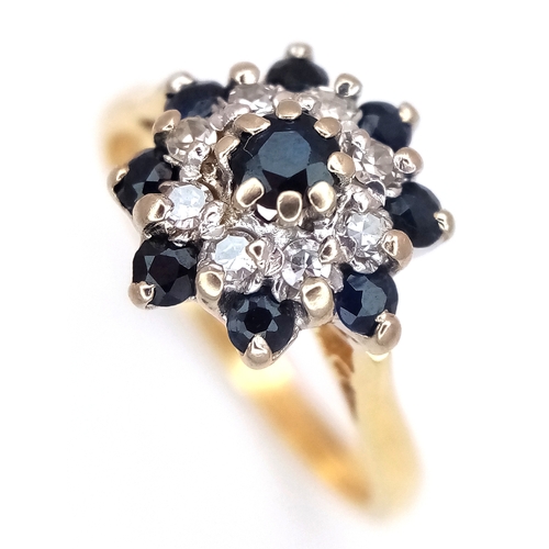 50 - AN 18K YELLOW GOLD, DIAMOND AND SAPPHIRE, CLUSTER RING. 3.3G. SC 8043