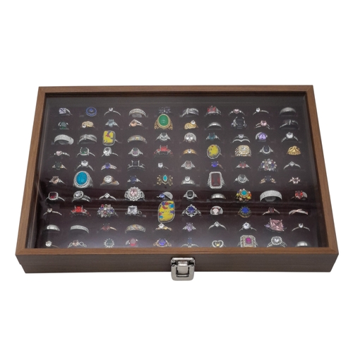 634 - A Jewellery Display Case with 100 Rings! An absolutely fabulous lot with different colored stones to... 