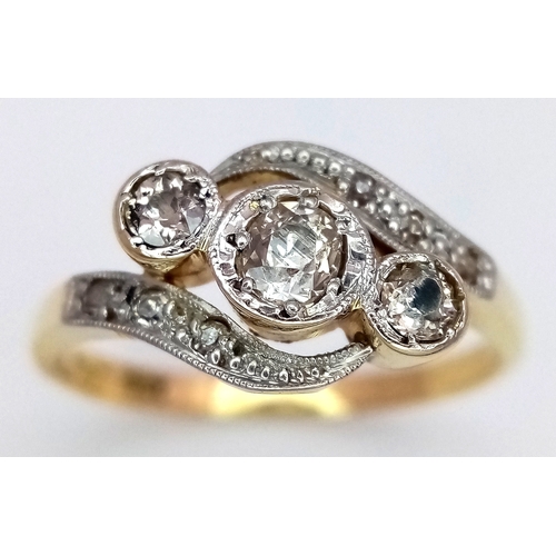71 - AN 18K YELLOW GOLD AND PLATINUM, ANTIQUE, OLD CUT DIAMOND, 3 STONE TWIST RING. 0.30 CTW. 3.3G, SIZE ... 