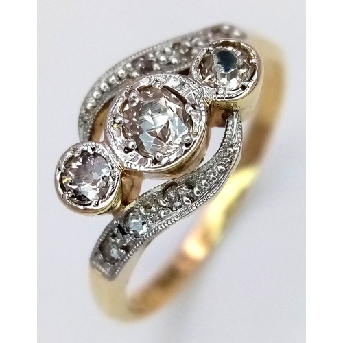 71 - AN 18K YELLOW GOLD AND PLATINUM, ANTIQUE, OLD CUT DIAMOND, 3 STONE TWIST RING. 0.30 CTW. 3.3G, SIZE ... 