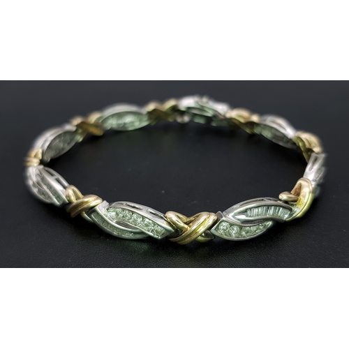 8 - A 14K 2 TONE GOLD, MIXED CUT, DIAMOND SET BRACELET. 1.50 CTW, 18G. SC 8021