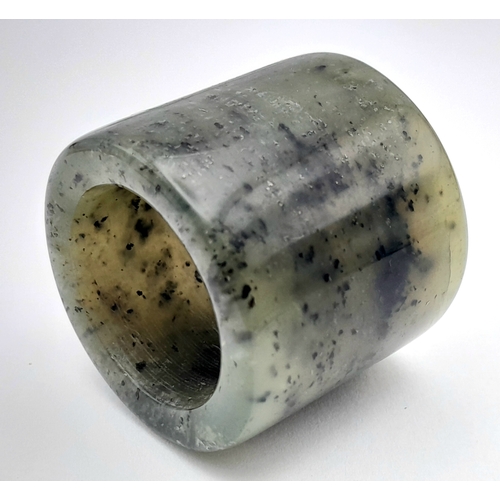636 - A Vintage Nephrite Jade Green Archers Ring Size Z+1. The ring measures 3.2cm Length and has a gross ... 