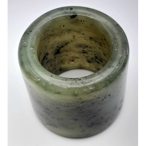 636 - A Vintage Nephrite Jade Green Archers Ring Size Z+1. The ring measures 3.2cm Length and has a gross ... 