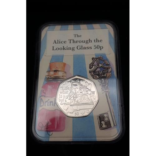 645 - A Very Collectible Alice Through The Looking Glass 50p Coin Collectors Edition. Five coins each sepa... 