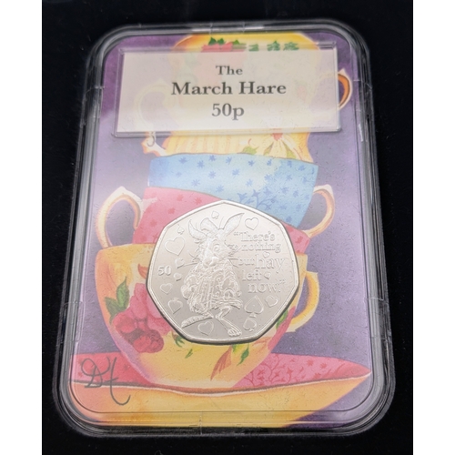 645 - A Very Collectible Alice Through The Looking Glass 50p Coin Collectors Edition. Five coins each sepa... 