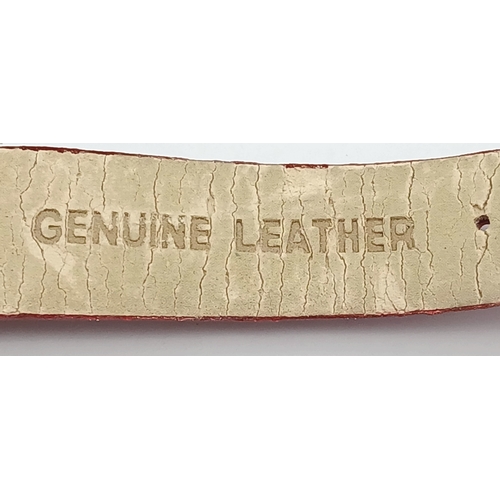 677 - A LACOSTE, RED LEATHER STRAP WATCH. ORIGINAL STRAP AND BUCKLE. IN FULL WORKING ORDER. NEW BATTERY FI... 