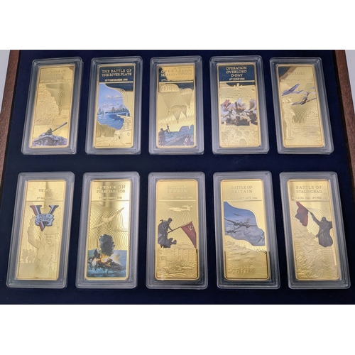 709 - A Collection of Ten Gold Plated Ingots - Commemorative WW2 Battles. Comes with COA and case.