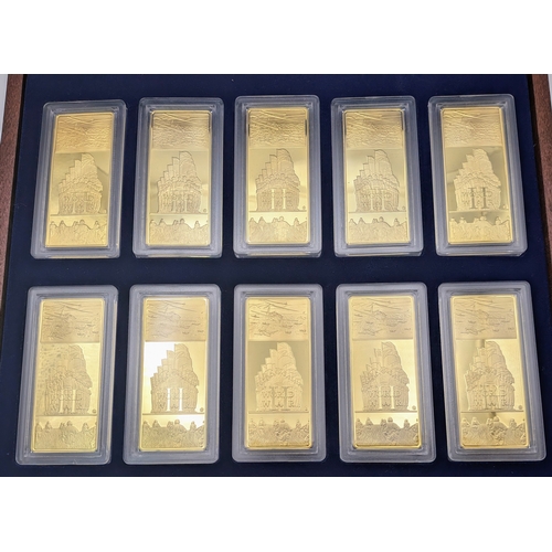 709 - A Collection of Ten Gold Plated Ingots - Commemorative WW2 Battles. Comes with COA and case.