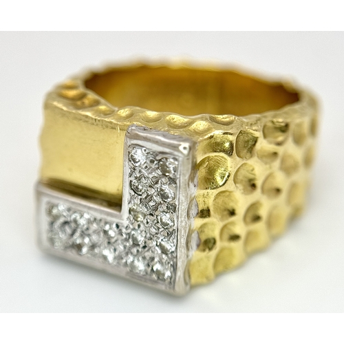 11 - A Statement 18K Yellow Gold and Diamond Gents Signet Ring. Dimple effect band with an 'L' shaped dia... 