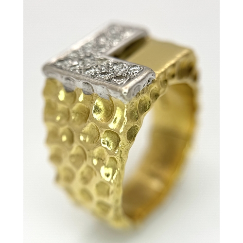 11 - A Statement 18K Yellow Gold and Diamond Gents Signet Ring. Dimple effect band with an 'L' shaped dia... 