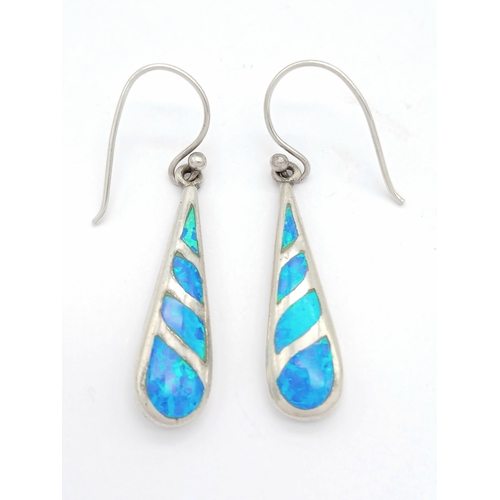 1333 - A Pretty Pair of Sterling Silver Opal Set Dangle Earrings. 4cm drop and 8mm wide at their widest poi... 
