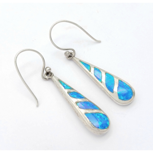 1333 - A Pretty Pair of Sterling Silver Opal Set Dangle Earrings. 4cm drop and 8mm wide at their widest poi... 