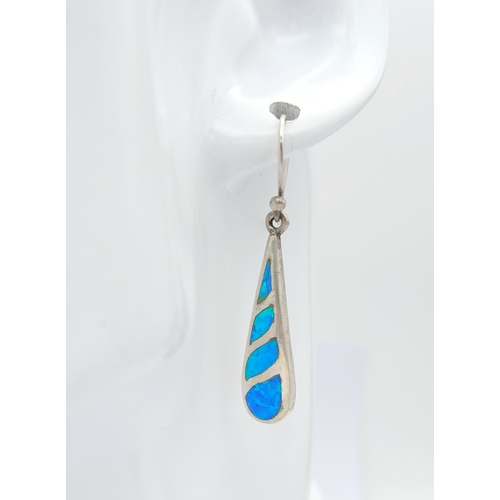 1333 - A Pretty Pair of Sterling Silver Opal Set Dangle Earrings. 4cm drop and 8mm wide at their widest poi... 