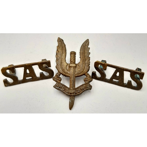 550 - WW2 Middle East Made Sand Cast SAS Shoulder Titles and small Cap/Collar Badge.