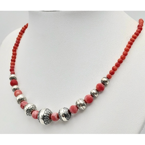 622 - A Vintage Sterling Silver and Coral Beaded Necklace. Fits 43cm plus length. The Largest Centre Silve... 