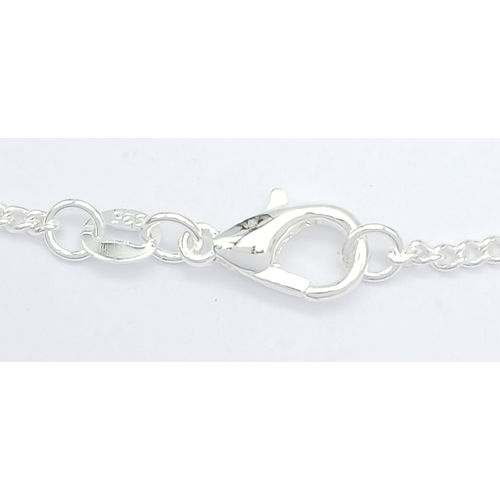 629 - A Stylish Sterling Silver Blue Topaz Pendant Necklace-46cm Length Chain. Set with a 9 x 7mm Rectangl... 