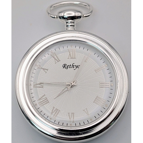 657 - Two Silver Plated Pocket Watches Comprising 1) A Key Wind Manual Pocket Watch with Chain and 2) A To... 